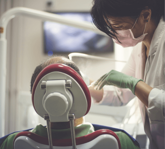 Doctor Buller treating dental patient
