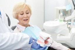 Man with dentures laughing