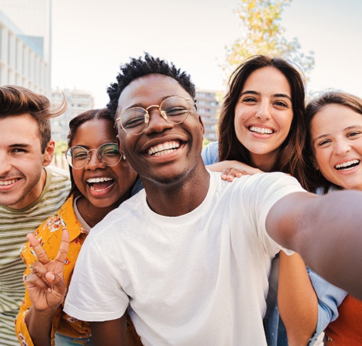 Teen in Gahanna smiling confidently while wearing nearly invisible clear aligners 
