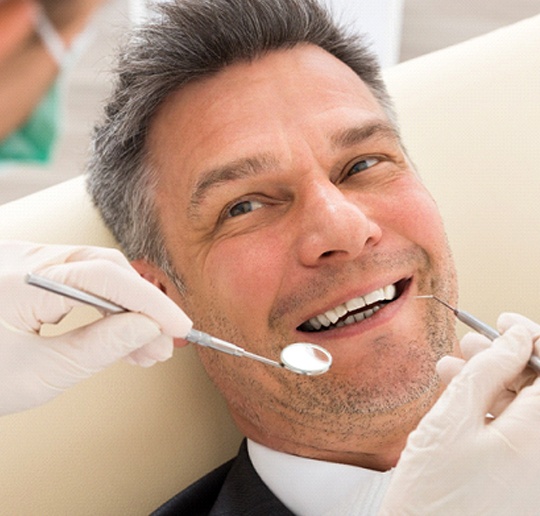 Man at dentist for dental crown in Gahanna