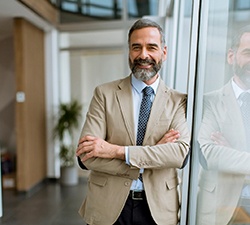 Man smiling in an office