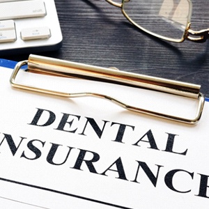 dental insurance form on table