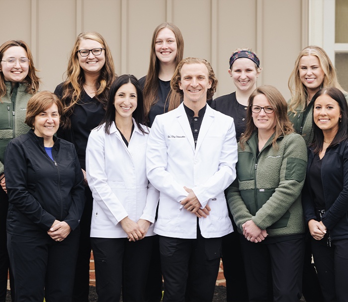 Gahanna dentists and dental team members smiling