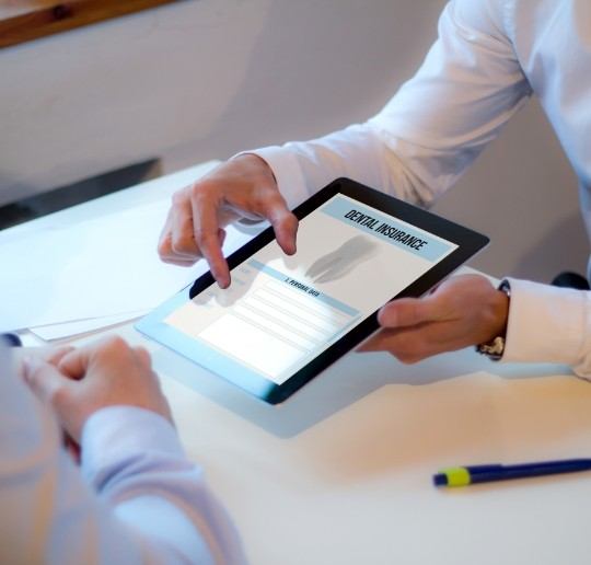 Dental insurance forms on tablet computer