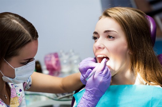 Patient receiving restorative dental treatment
