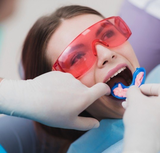 Patient receiving fluoride treatment