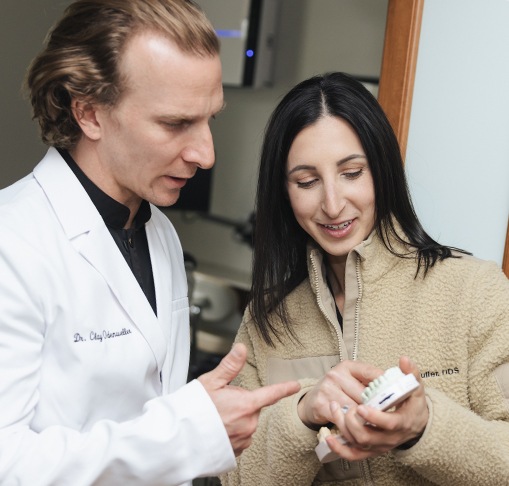 a dentist discussing a full mouth reconstruction in Gahanna